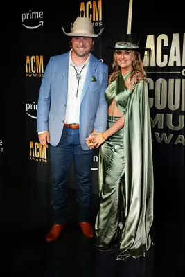 Lainey Wilson and Devlin Hodges at the red carpet of the 2023 ACM Awards