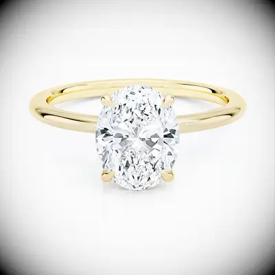 Oval-cut engagement ring on a gold band