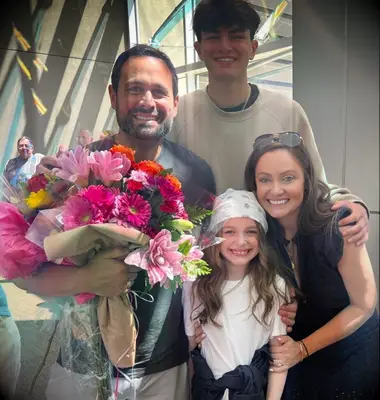 Jason and Molly Mesnick with their kids