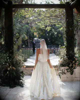 Alex Cooper walking down the aisle at her wedding