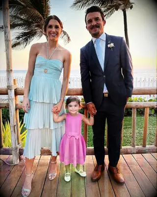 Alex Morgan, Servando Carrasco, and their daughter Charlie 