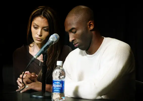 Los Angeles Lakers star Kobe Bryant and his wife Vanessa appear at news conference at Staples Center, the home of the Lakers, July 18, 2003 