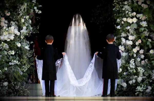 Meghan Markle entering wedding reception with page boys