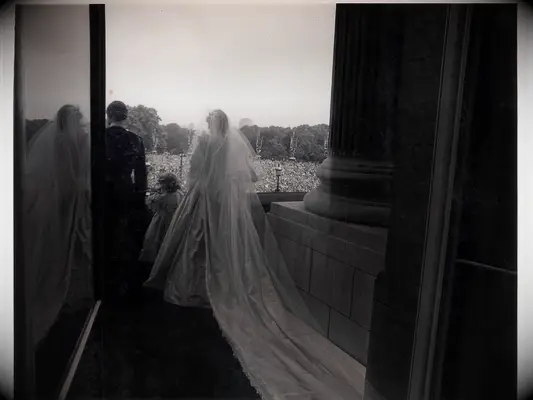 Princess Diana and Prince Charles overlook Buckingham Palace