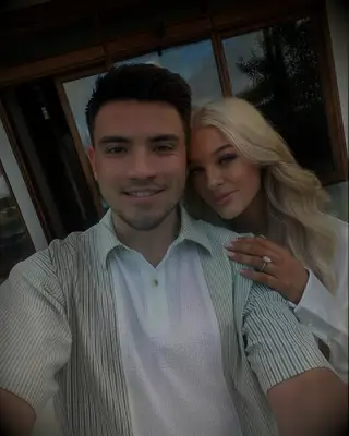 Montreal Canadiens center Nick Suzuki and fiancee Caitlin Fitzgerald