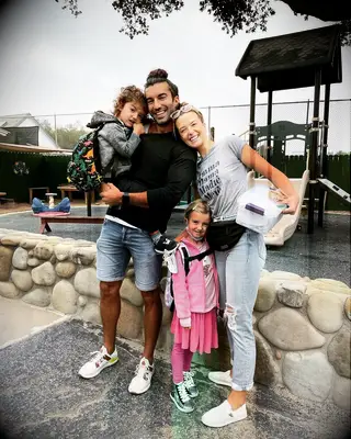 Justin Baldoni with his wife Emily and their kids
