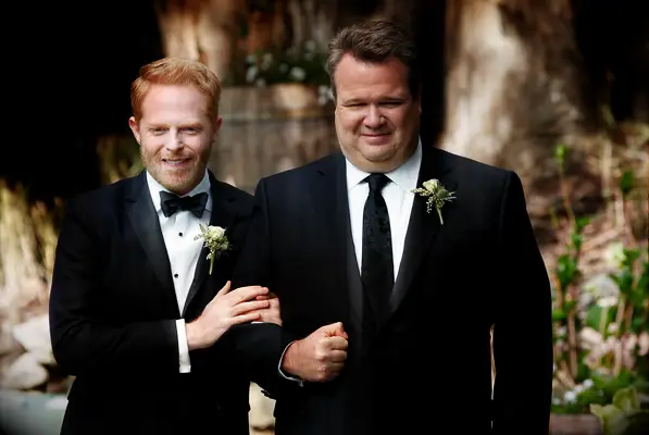 Cam and Mitch from Modern Family on their wedding day