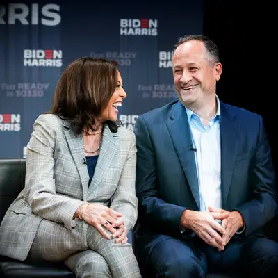 VP Kamala Harris and husband Doug Emhoff laughing together 