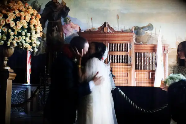 Vice President Kamala Harris and husband Doug Emhoff kissing on wedding day