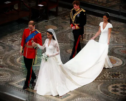 Kate and Will walk down the aisle with Harry and Pippa behind them. 