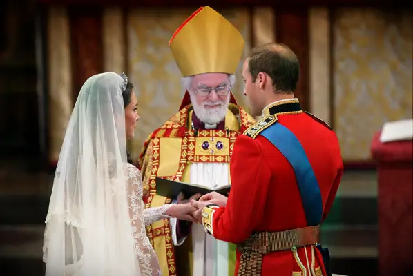 Kate and Will exchange rings. 