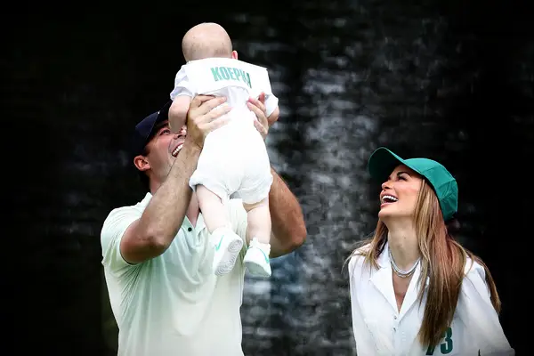 Brooks Koepka with his wife and son at the 2024 Masters
