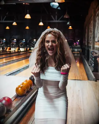 Joey King bowling at her wedding