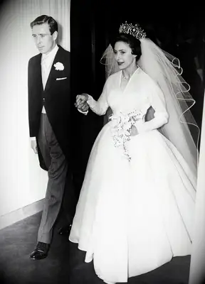 Princess Margaret wears the Poltimore tiara. 