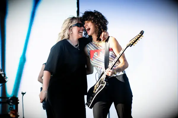 Renée Rapp and girlfriend Towa Bird performing at Coachella