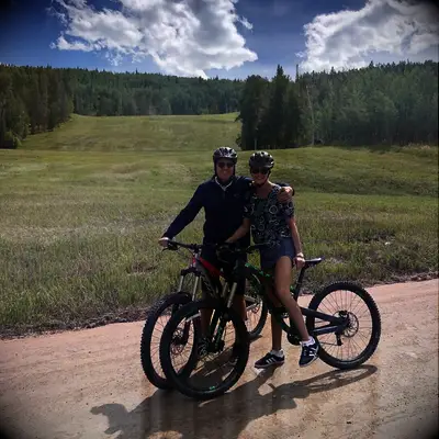 Lara Spencer and Rick McVey on bicycles