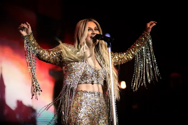Kelsea Ballerini giving a concert in sequins