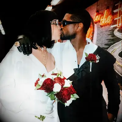 Usher and Jenn Goicoechea