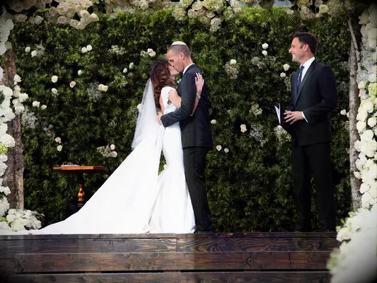 Bachelorette Ashley Hebert and JP Rosenbaum kissing during wedding ceremony