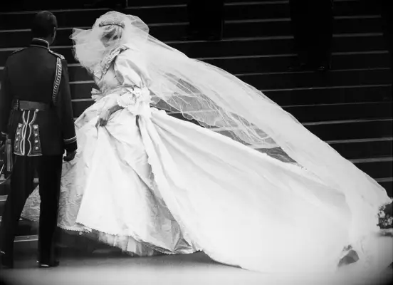 Black and white image of Princess Diana wearing wedding dress on her wedding day