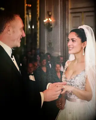 Salma Hayek smiling with husband on wedding day