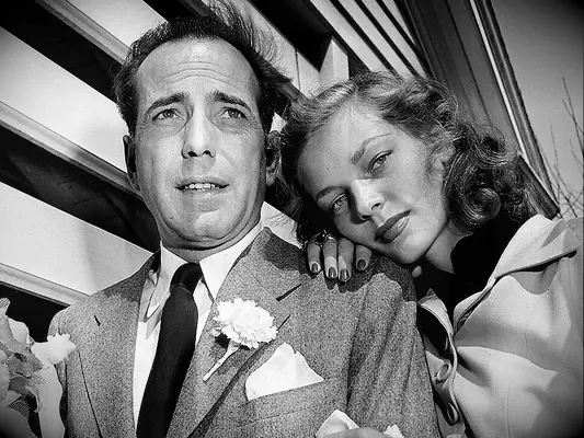 Humphrey Bogart and Lauren Bacall iconic celebrity couple. 