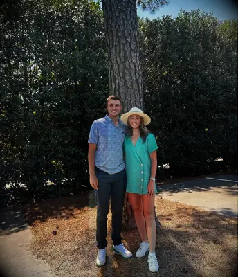 Ludvig Åberg and Olivia Peet posing for a picture