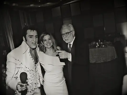 Elvis impersonator, Brianna Keilar and Wolf Blitzer at Las Vegas wedding