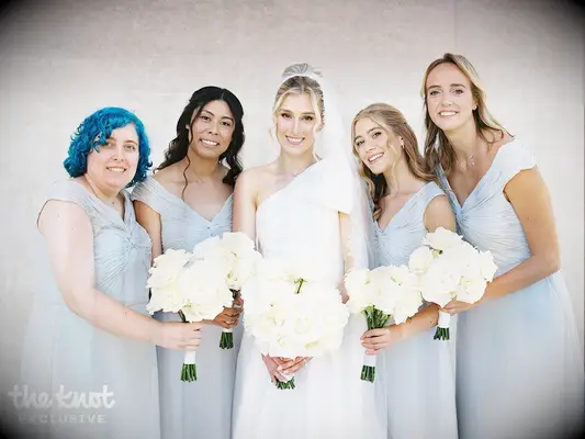 Jenna Adams posing with her bridesmaids