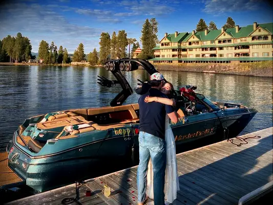 Miles and Keleigh Teller with his boat anniversary gift 