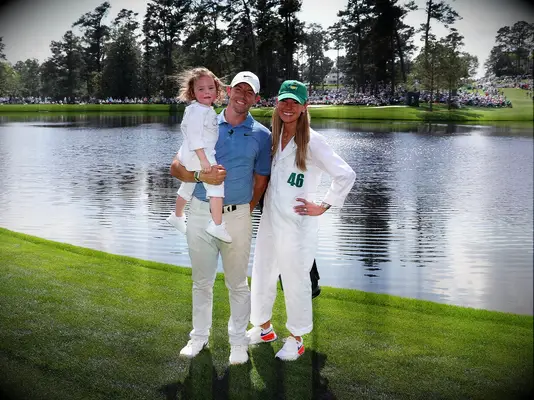 Rory McIlroy, Erica Stoll, and their daughter