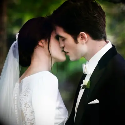 Bella and Edward kissing during the Twilight wedding