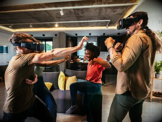Group playing with virtual reality goggles