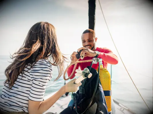 Couple on a boat for joint bach party