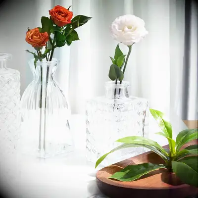 Glass flower vases rehearsal dinner decor