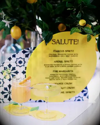 Lemon themed rehearsal dinner bar decor