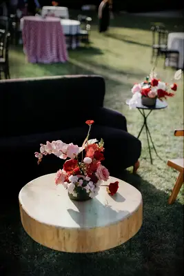 Rehearsal dinner lounge area with floral and wood decor inspiration