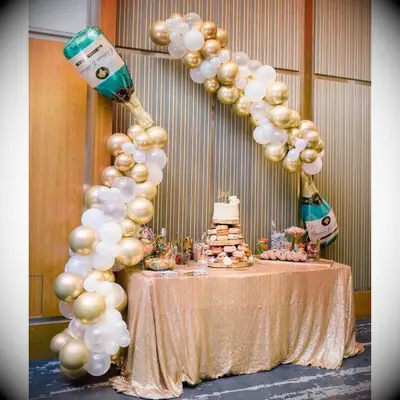 Champagne bottle balloon arch