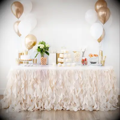 Champagne gold table skirt for a bachelorette party. 