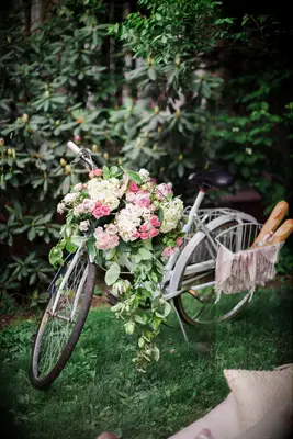 Decorated bike with florals and bread in a basket