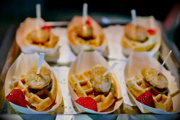 Mini chicken and waffle portions for a bridal shower. 