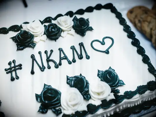 Black and white engagement cake that says 