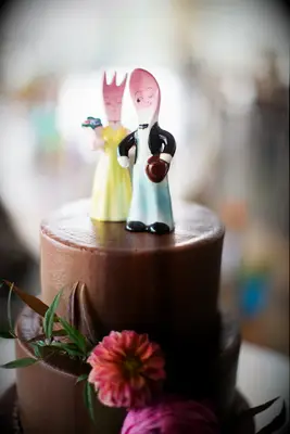Chocolate engagement cake with spoon and fork cake topper