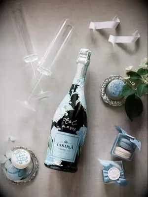Floral painted Prosecco bottle for bridal shower decoration