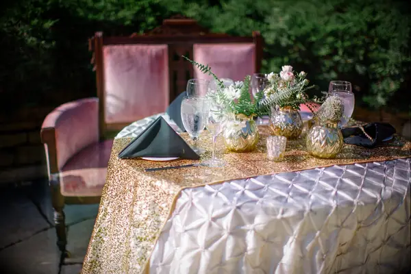 Gold and champagne table linens for bridal showers