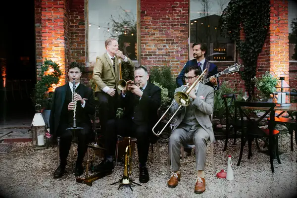 Jazz band playing at an outdoor venue.