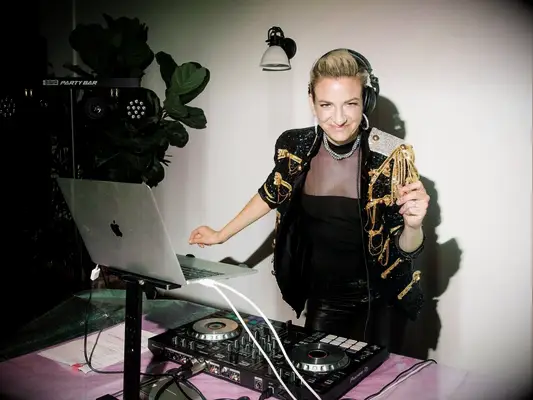 DJ playing at a wedding reception. 