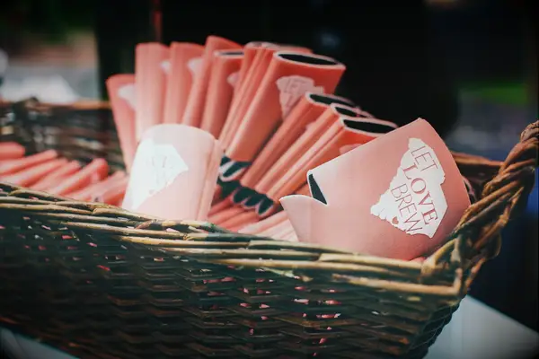 Personalized koozie gift idea at BBQ engagement party. 