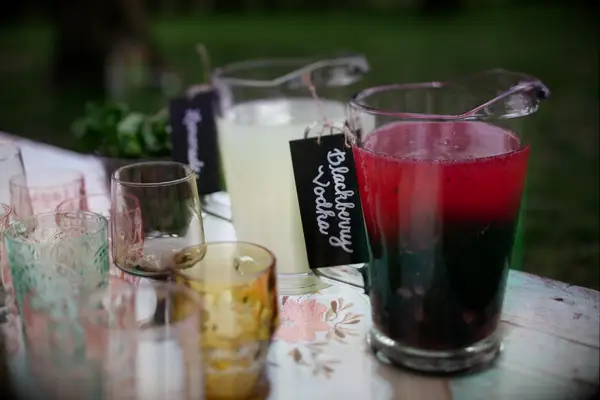 Signature cocktail pitcher at BBQ engagement party. 