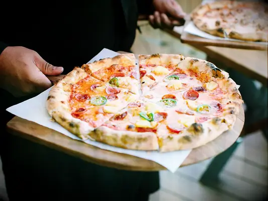 Wood fired pizza at rehearsal dinner